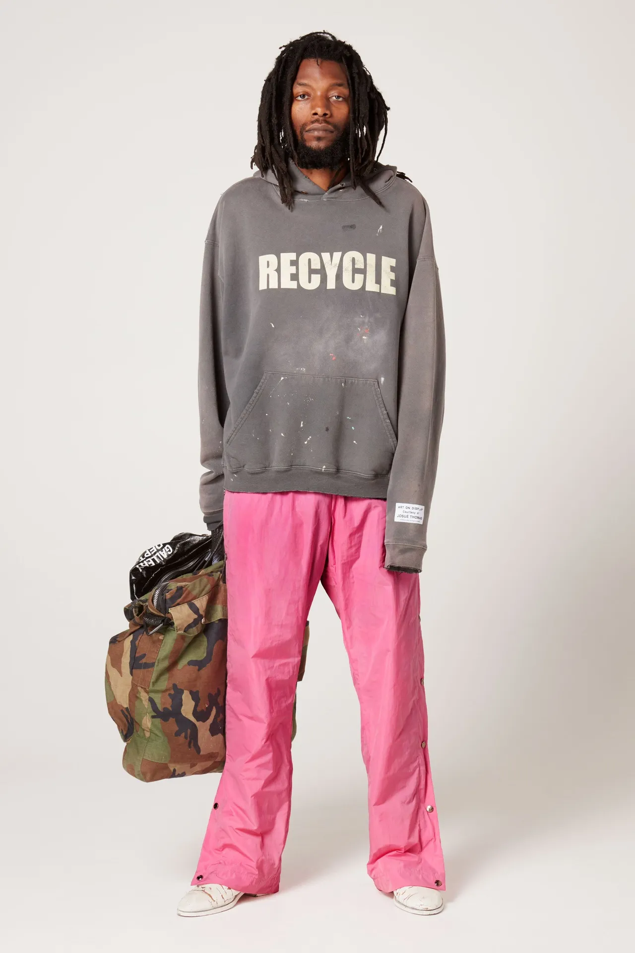 GALLERY DEPT. 90'S RECYCLE HOODIE WASHED BLACK 90'S washed hoodie with distressed eco-friendly slogans. Washed black S-XL. Ready-made garments are washed and dyed again. Multiple spots throughout the body are spray-faded. The ribs are cut and worn.